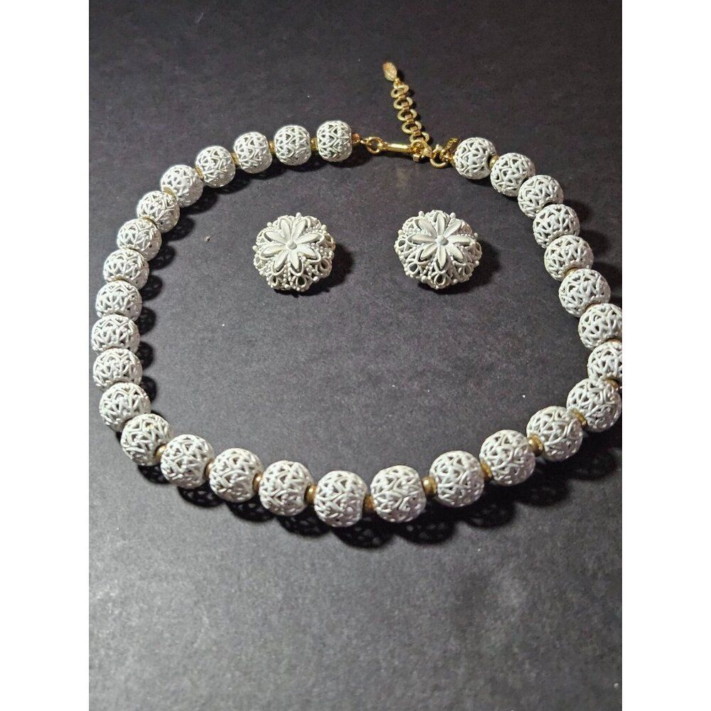 Monet vintage gold tone and white necklace and earring set